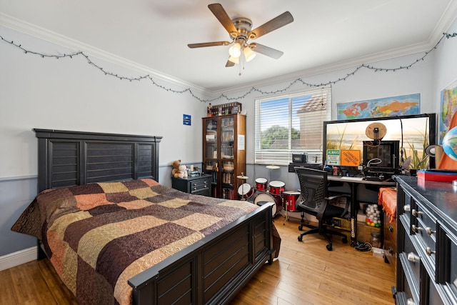 bedroom featuring ceiling fan, crown molding, and light hardwood / wood-style flooring