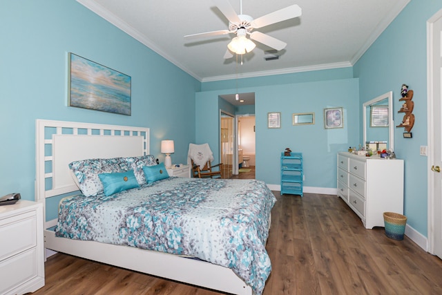 bedroom with dark wood-type flooring, ornamental molding, and ceiling fan