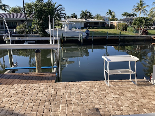 view of dock with a water view