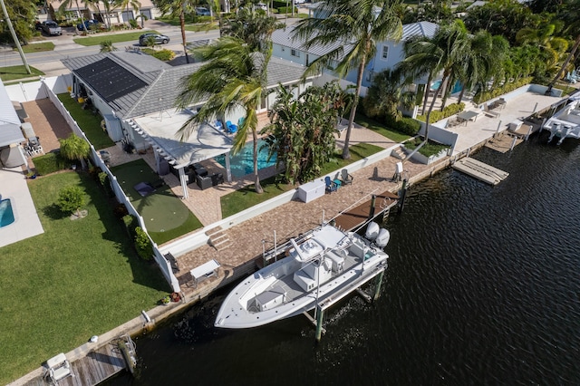 drone / aerial view with a water view