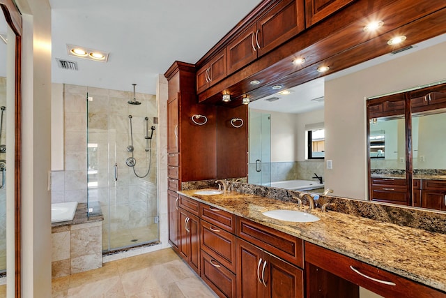 bathroom featuring vanity, tile patterned floors, and independent shower and bath