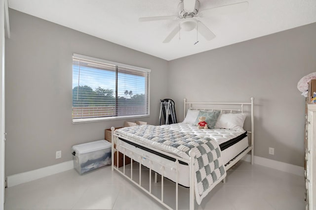 bedroom featuring ceiling fan and light tile patterned floors