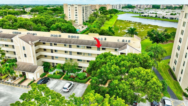 bird's eye view with a water view