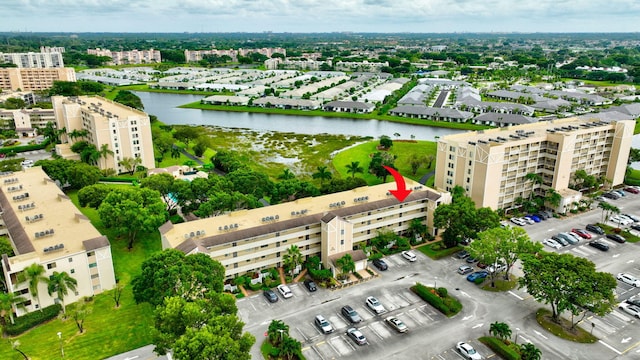 drone / aerial view featuring a water view