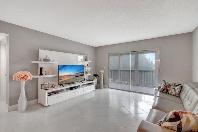 living room featuring a textured ceiling