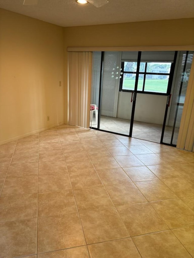 unfurnished bedroom featuring light tile patterned flooring