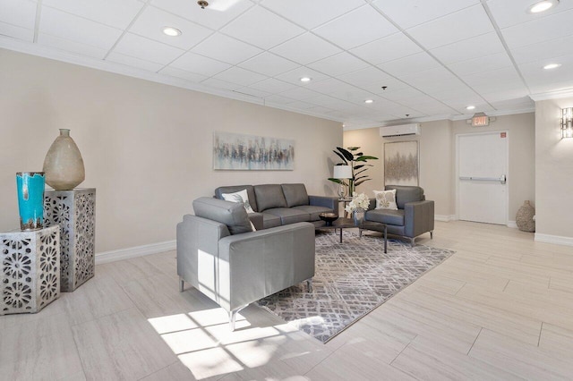 living room featuring ornamental molding and a wall mounted air conditioner