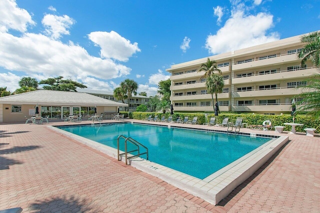 view of swimming pool featuring a patio