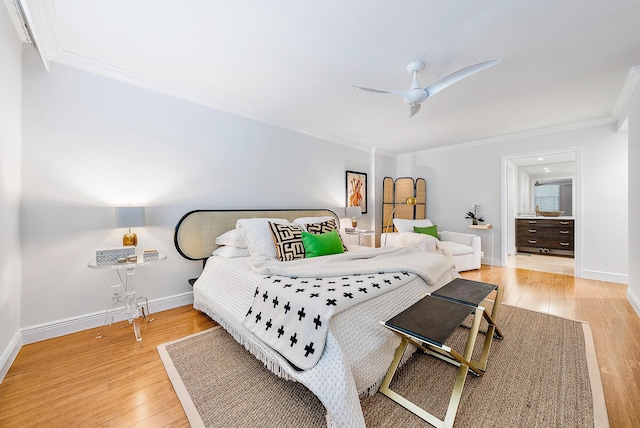 bedroom with crown molding, wood-type flooring, and ceiling fan