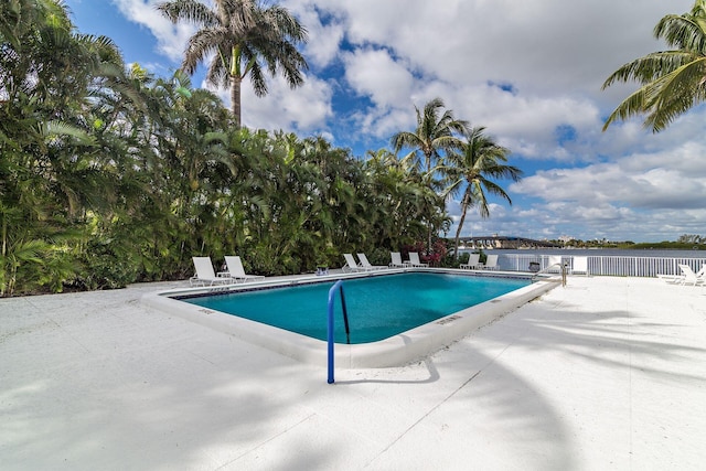 view of swimming pool featuring a patio