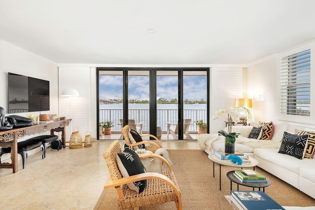 living room with crown molding and a water view