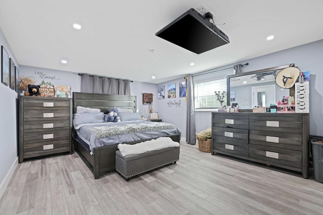 bedroom featuring light hardwood / wood-style floors