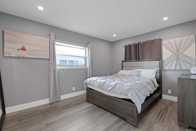 bedroom featuring hardwood / wood-style flooring