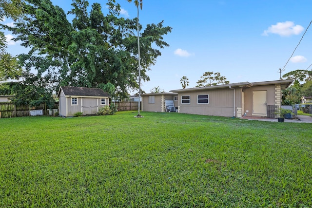 view of yard with a storage shed