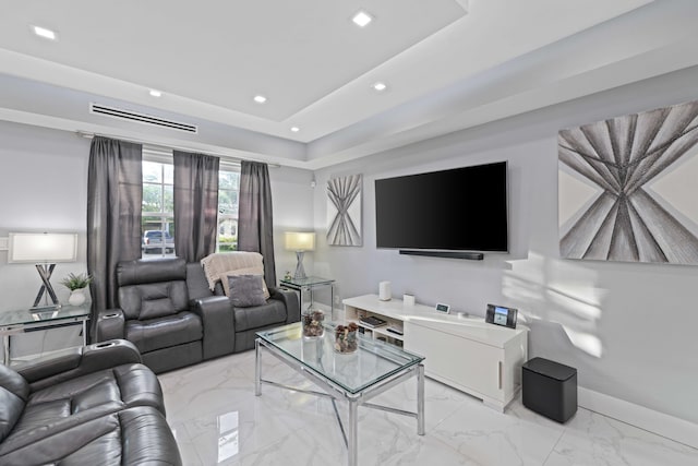 living room with a raised ceiling