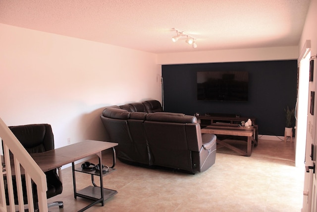 living room with a textured ceiling