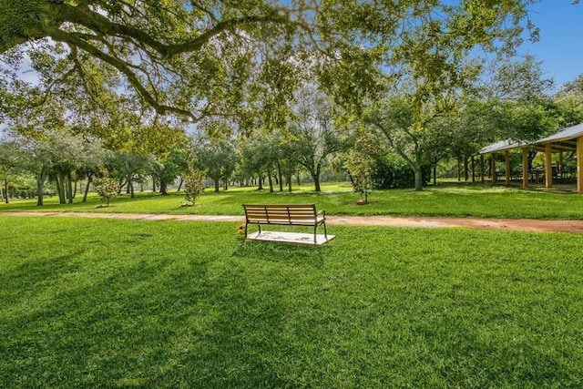 surrounding community featuring a lawn