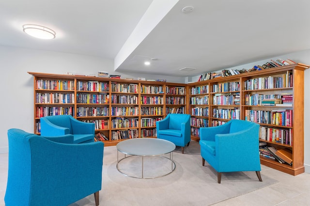 living area with light tile patterned floors