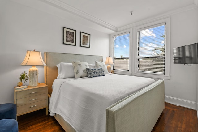 bedroom featuring dark hardwood / wood-style flooring and ornamental molding