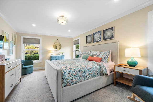 carpeted bedroom with ornamental molding