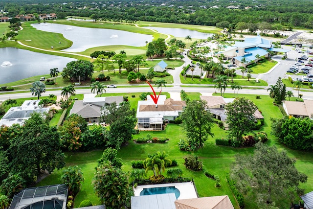 bird's eye view with a water view