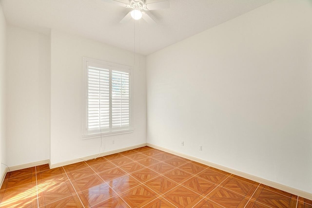 unfurnished room with ceiling fan