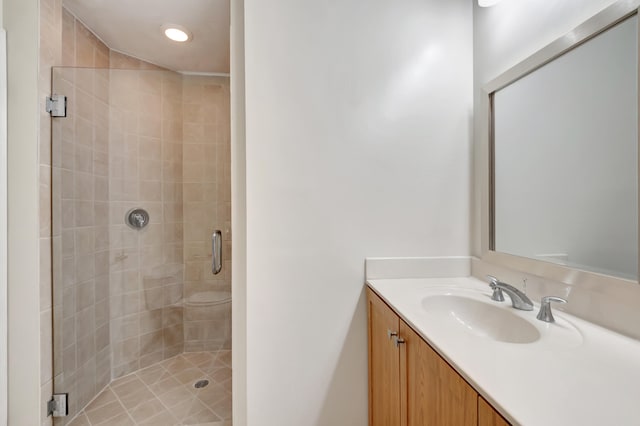 bathroom with vanity and walk in shower