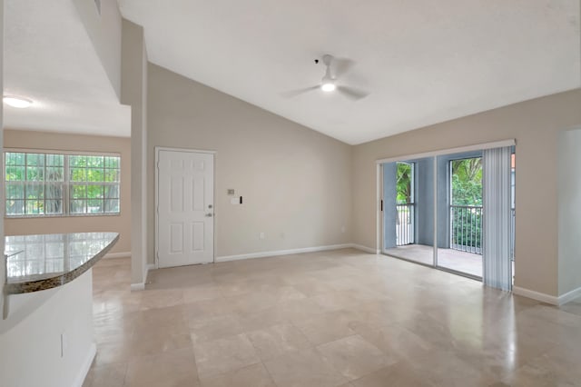 interior space with ceiling fan and lofted ceiling