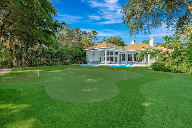 back of house featuring a patio area