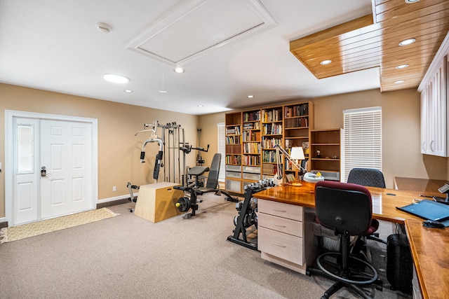 carpeted office with wooden ceiling