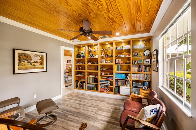 sitting room featuring ceiling fan, wood ceiling, ornamental molding, and hardwood / wood-style floors