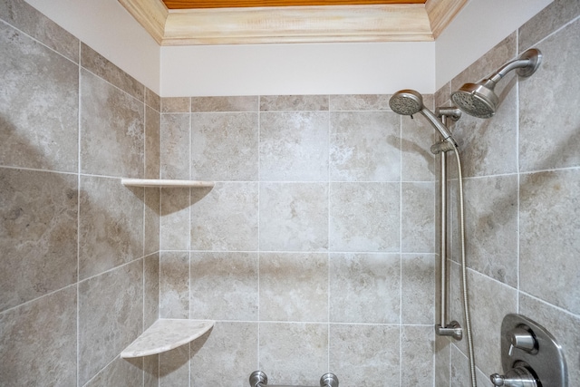 bathroom with a tile shower