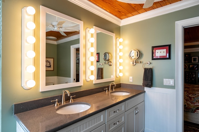 bathroom featuring vanity, ceiling fan, ornamental molding, and wooden ceiling