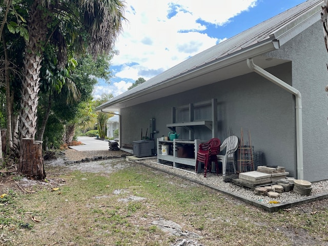 view of property exterior with central air condition unit