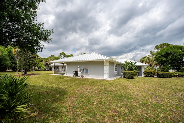 exterior space featuring a lawn