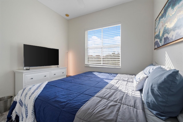 bedroom with vaulted ceiling