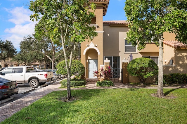 view of front of house with a front yard