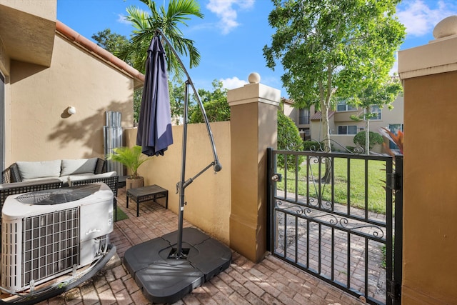 view of patio featuring central AC