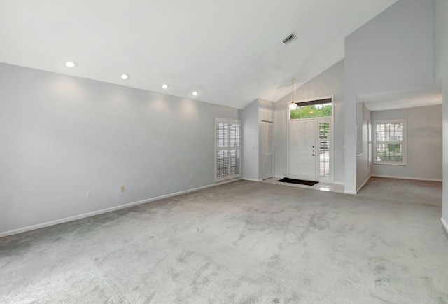 interior space with high vaulted ceiling