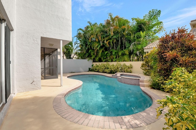 view of pool featuring a patio area