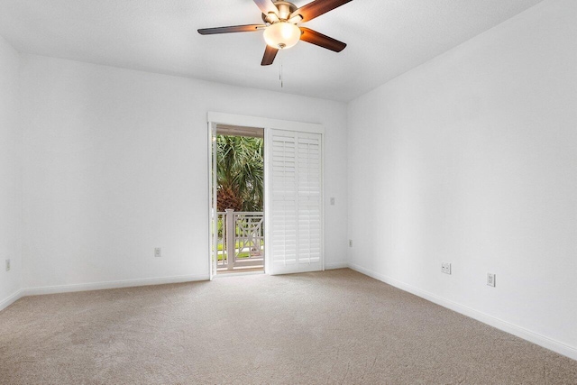 unfurnished room with carpet floors and ceiling fan