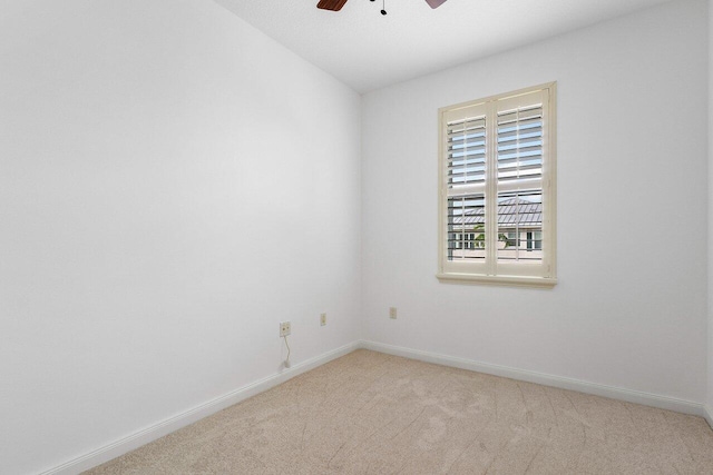 unfurnished room with light carpet and ceiling fan