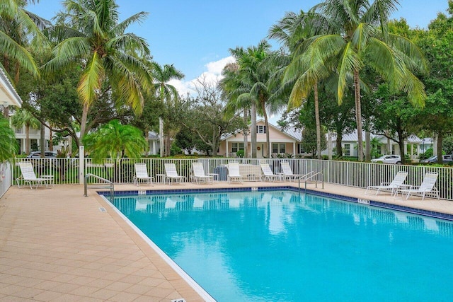 view of swimming pool with a patio