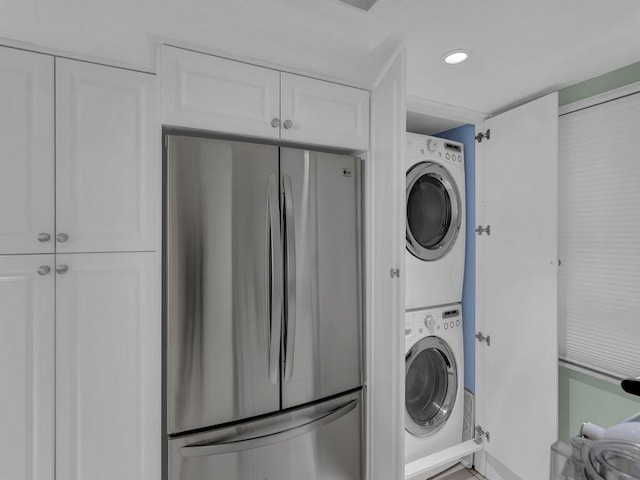 washroom with stacked washer / dryer