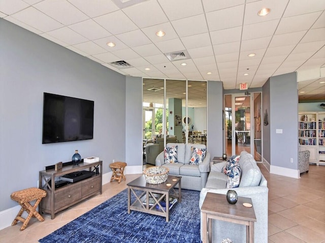 living room with tile patterned flooring