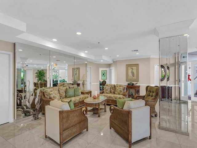 living room with crown molding and a wealth of natural light