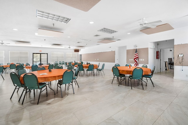 dining room featuring ceiling fan