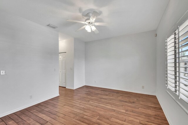 unfurnished room with light hardwood / wood-style floors and ceiling fan