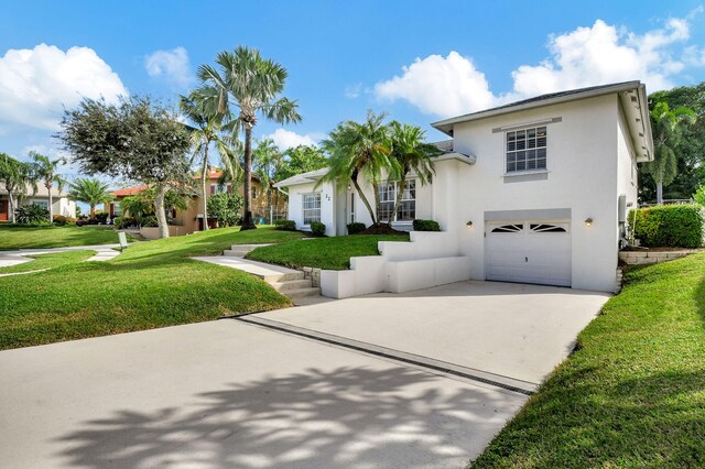 view of exterior entry with a lawn