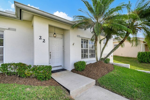 unfurnished bedroom with ceiling fan, light tile patterned floors, french doors, and two closets